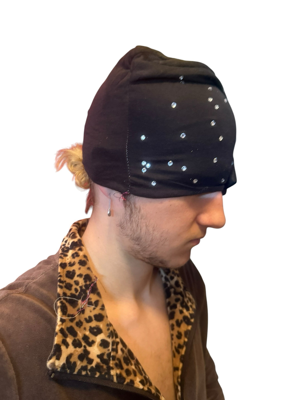 IFEELGREED black stretchy head wrap featuring scattered sparkling rhinestones worn by a person in a leopard print top