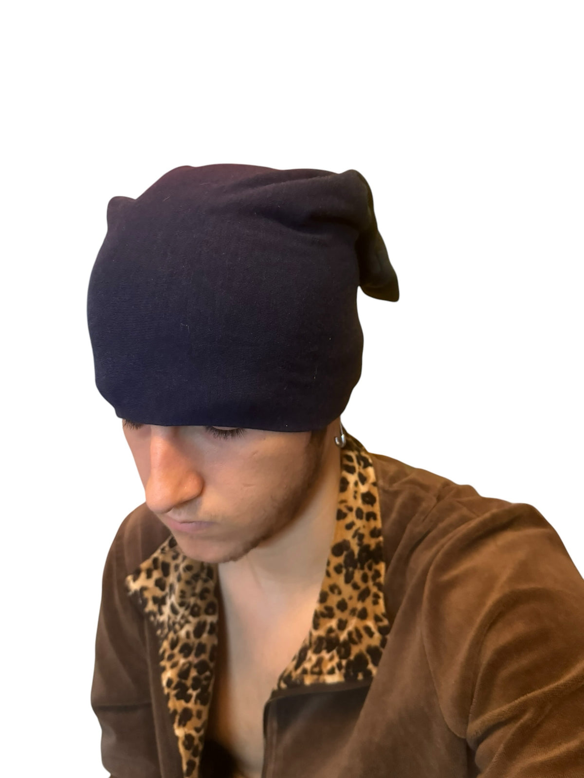 A man wearing an IFEELGREED navy blue slouchy cotton beanie with a relaxed fit against a white background.